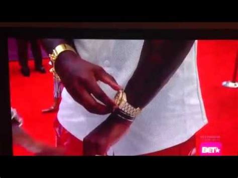 Fake It Till You Make It: Ace Hood’s Gold Bezel “Rolex” Watch 